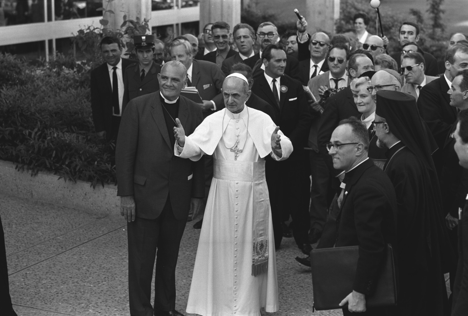Blessed Pope Paul VI stands next to Eugene C. Blake, general secretary of the World Council of Churches, as he arrives at the headquarters of the WCC in Geneva June 10, 1969. Pope Francis is scheduled to attend an ecumenical prayer service and meeting at the WCC during a one-day visit to Geneva June 21.